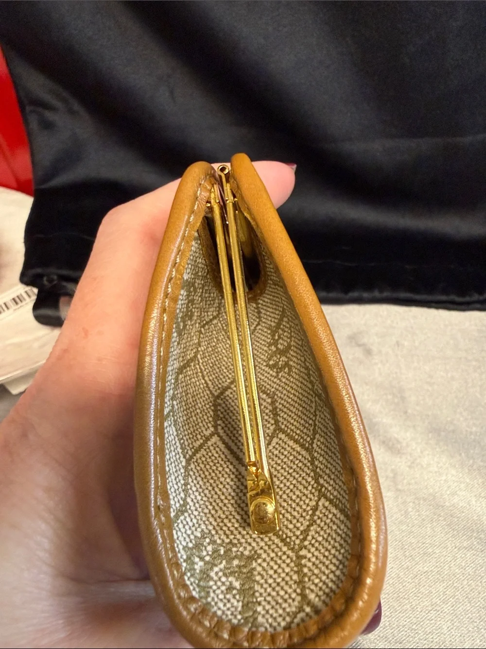 Dior honeycomb kiss lock coin purse.